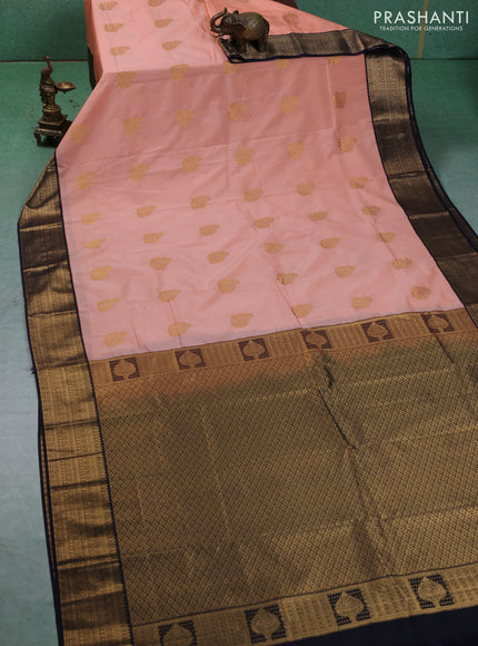 Semi kanchipuram silk saree peach shade and navy blue with zari woven buttas and zari woven border