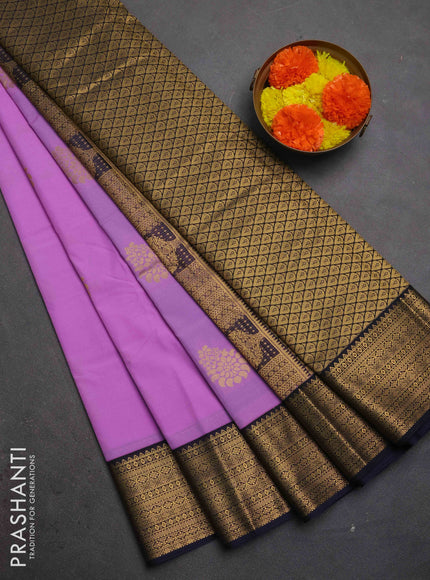 Semi kanchipuram silk saree lavender and navy blue with zari woven buttas and zari woven korvai border