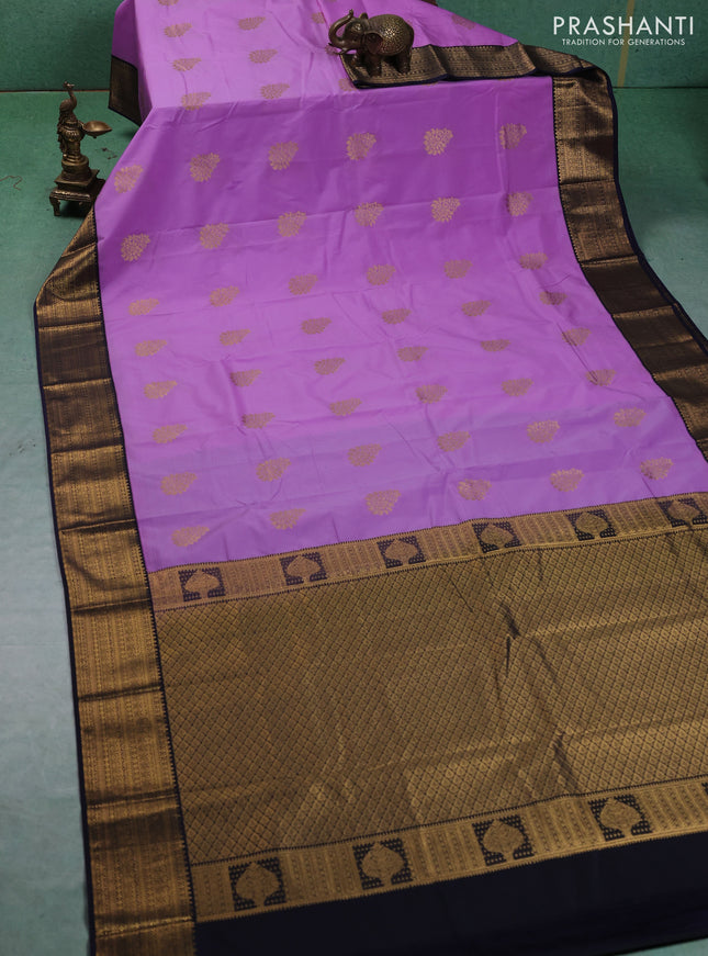 Semi kanchipuram silk saree lavender and navy blue with zari woven buttas and zari woven korvai border
