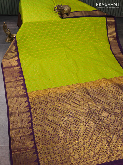 Semi kanchipuram silk saree lime green and deep purple with allover checks & zari woven buttas and zari woven korvai border