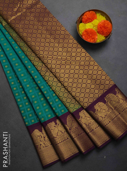 Semi kanchipuram silk saree teal green and deep purple with allover checks & zari woven buttas and zari woven korvai border