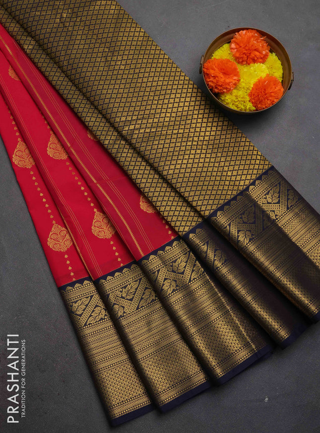 Semi kanchipuram silk saree tomato pink and navy blue with allover zari weaves & buttas and long zari woven korvai border