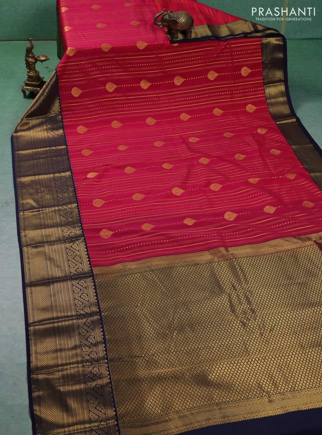 Semi kanchipuram silk saree tomato pink and navy blue with allover zari weaves & buttas and long zari woven korvai border