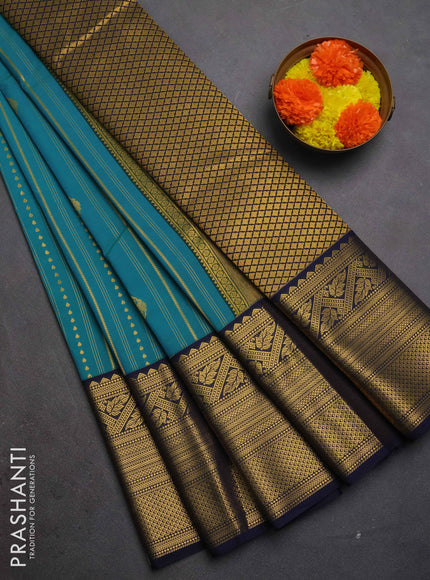 Semi kanchipuram silk saree dual shade of blue and navy blue with allover zari weaves & buttas and long zari woven korvai border