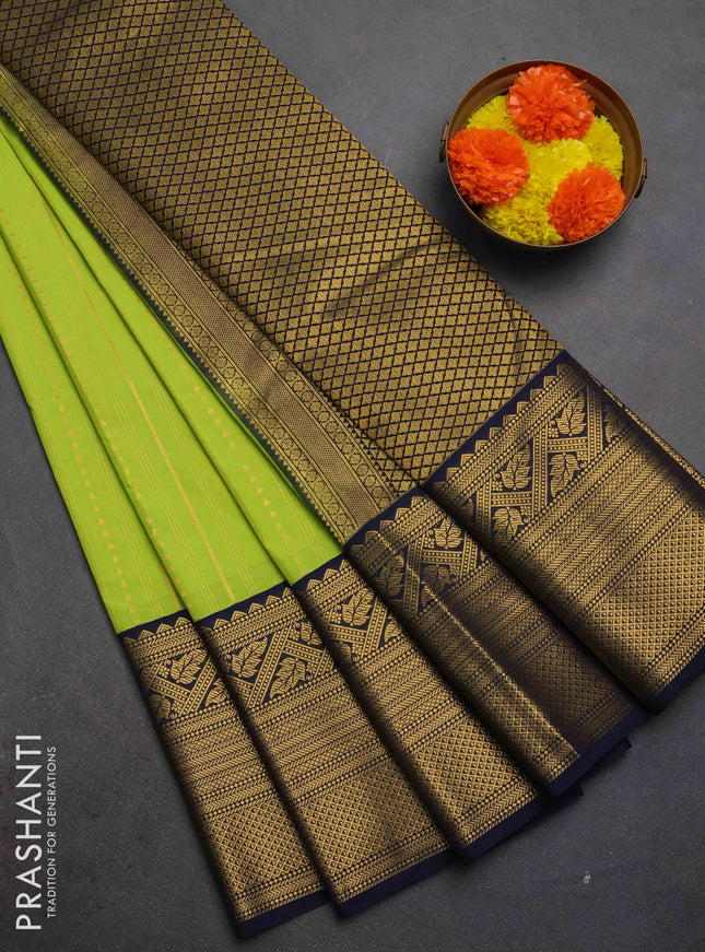 Semi kanchipuram silk saree lime green and navy blue with allover zari weaves & buttas and long zari woven korvai border