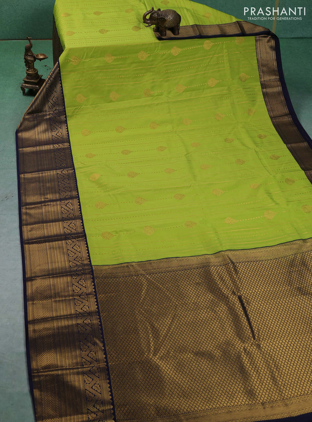 Semi kanchipuram silk saree lime green and navy blue with allover zari weaves & buttas and long zari woven korvai border