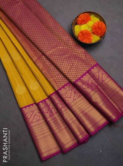 Semi kanchipuram silk saree mustard yellow and magenta pink with allover zari weaves & buttas and long zari woven korvai border