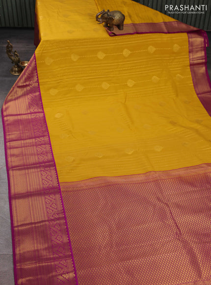 Semi kanchipuram silk saree mustard yellow and magenta pink with allover zari weaves & buttas and long zari woven korvai border