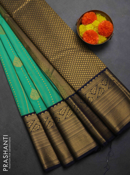 Semi kanchipuram silk saree teal green and navy blue with allover zari weaves & buttas and long zari woven korvai border
