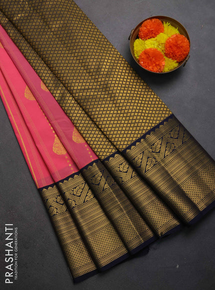 Semi kanchipuram silk saree peach pink and navy blue with allover zari weaves & buttas and long zari woven korvai border