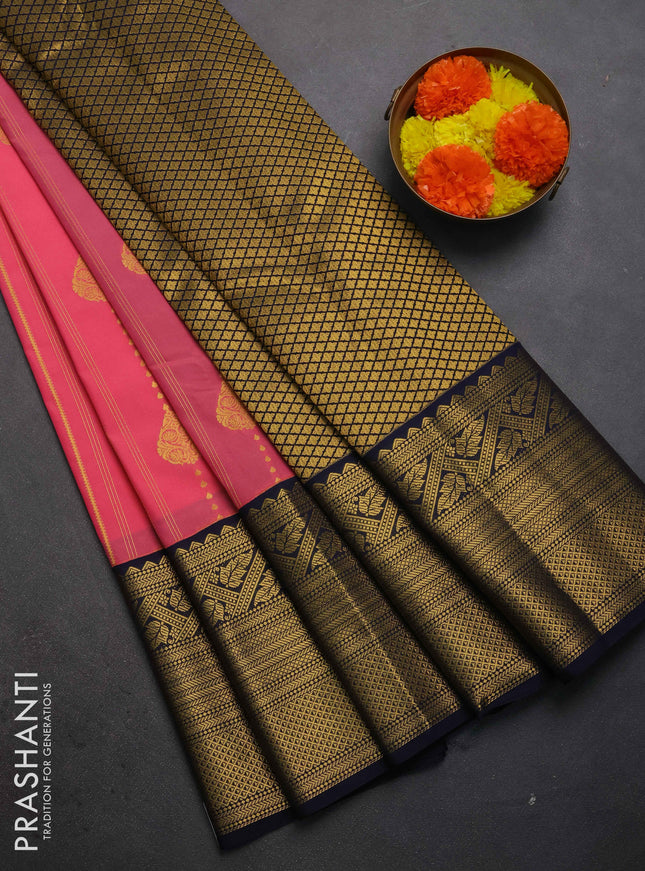 Semi kanchipuram silk saree peach pink and navy blue with allover zari weaves & buttas and long zari woven korvai border