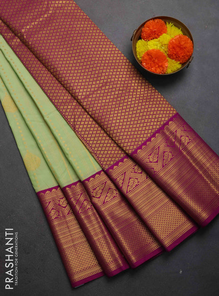 Semi kanchipuram silk saree pista green and pink with allover zari weaves & buttas and long zari woven korvai border