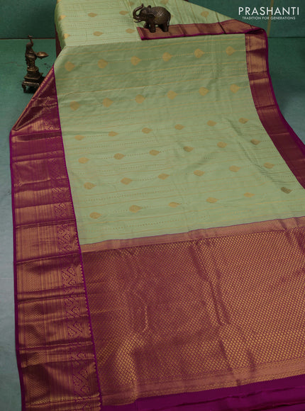 Semi kanchipuram silk saree pista green and pink with allover zari weaves & buttas and long zari woven korvai border
