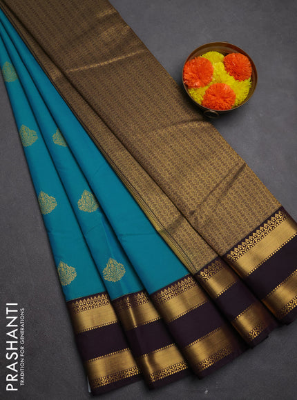 Semi kanchipuram silk saree teal green and deep purple with zari woven buttas and rettapet zari woven border