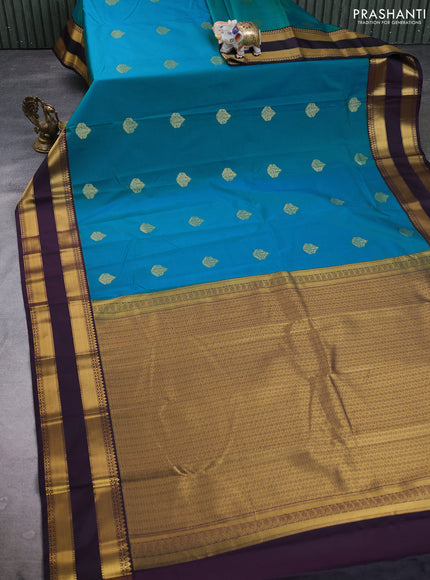 Semi kanchipuram silk saree teal green and deep purple with zari woven buttas and rettapet zari woven border