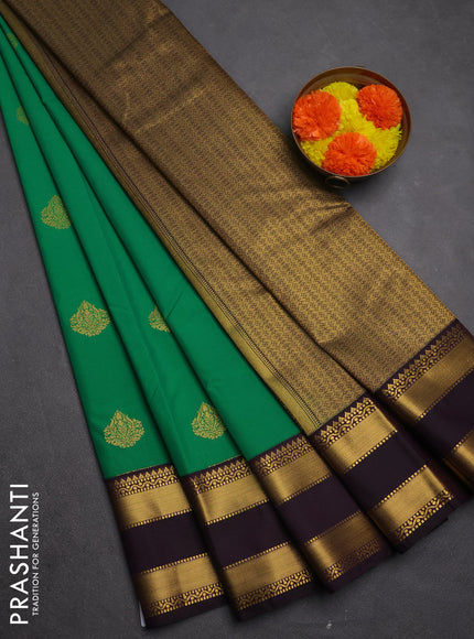 Semi kanchipuram silk saree green and deep purple with zari woven buttas and rettapet zari woven border