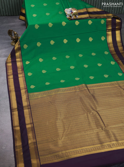 Semi kanchipuram silk saree green and deep purple with zari woven buttas and rettapet zari woven border
