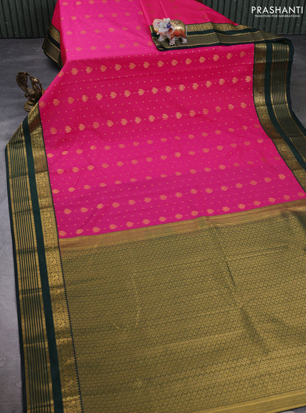 Semi kanchipuram silk saree pink and bottle green with allover zari woven buttas and zari woven korvai border