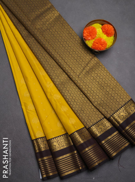 Semi kanchipuram silk saree mustard yellow and deep maroon with allover zari woven buttas and zari woven korvai border