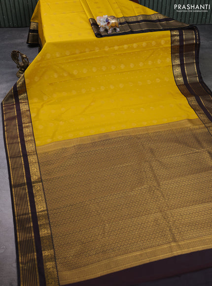 Semi kanchipuram silk saree mustard yellow and deep maroon with allover zari woven buttas and zari woven korvai border
