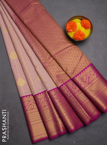 Semi kanchipuram silk saree pastel pink and pink with allover zari weaves & buttas and long zari woven border