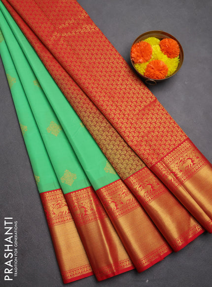 Semi kanchipuram silk saree light green and red with zari woven buttas and long zari woven border