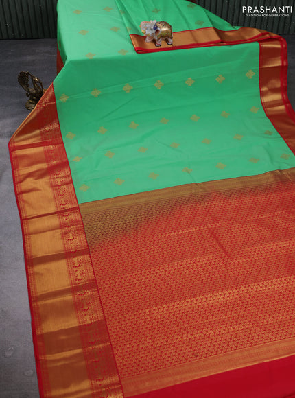 Semi kanchipuram silk saree light green and red with zari woven buttas and long zari woven border