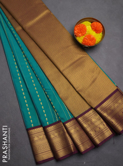 Semi kanchipuram silk saree teal blue and purple with allover zari weaves & buttas and zari woven border
