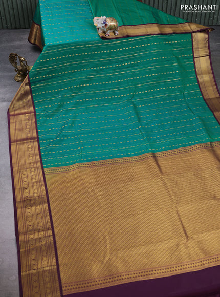 Semi kanchipuram silk saree green and deep wine shade with allover zari weaves & buttas and zari woven korvai border