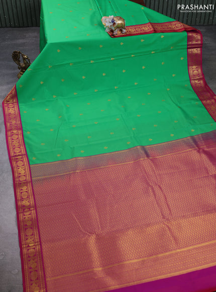 Semi kanchipuram silk saree green and pink with zari woven buttas and zari woven border