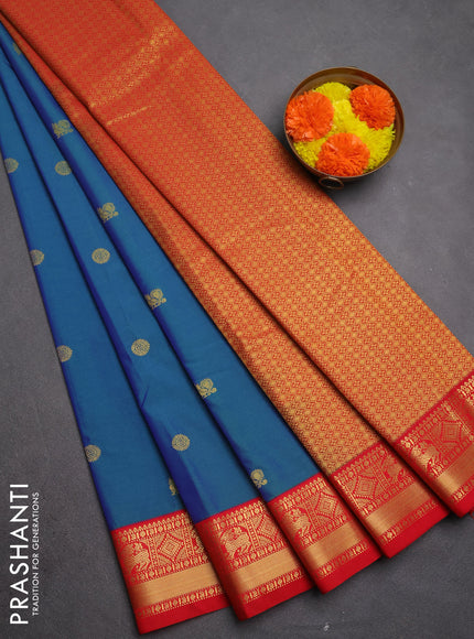 Semi kanchipuram silk saree dual shade of bluish green and red with zari woven buttas and zari woven korvai border
