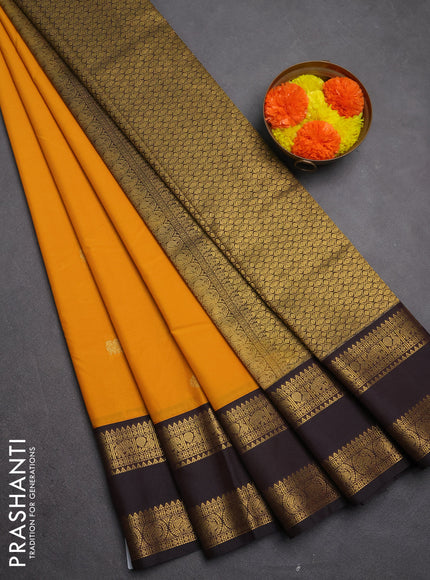 Semi kanchipuram silk saree dark mustard and coffee brown with zari woven buttas and rettapet zari woven border