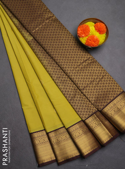 Semi kanchipuram silk saree lime yelllow and coffee brown with zari woven buttas and zari woven border