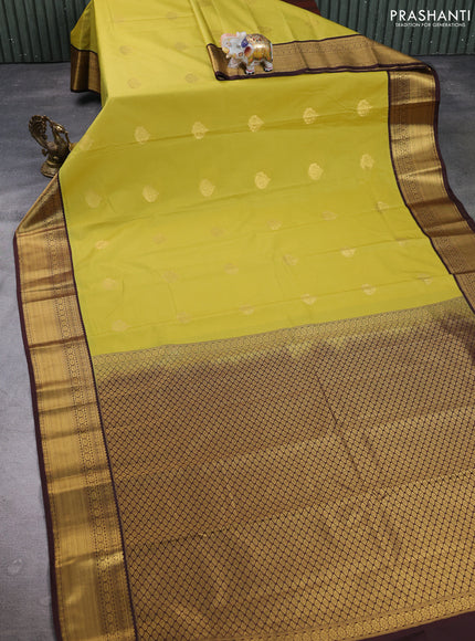 Semi kanchipuram silk saree lime yelllow and coffee brown with zari woven buttas and zari woven border
