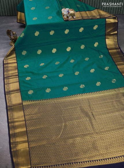 Semi kanchipuram silk saree green and navy blue with zari woven buttas and zari woven border