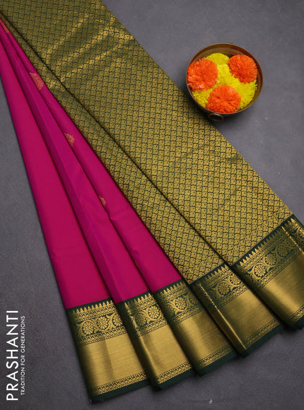Semi kanchipuram silk saree pink and bottle green with zari woven buttas and zari woven korvai border