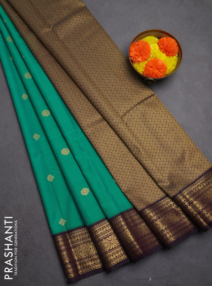 Semi kanchipuram silk saree teal green and deep purple with zari woven buttas and zari woven korvai border