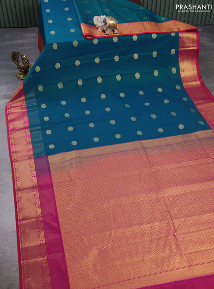 Semi kanchipuram silk saree peacock green and pink with zari woven buttas and long zari woven korvai border