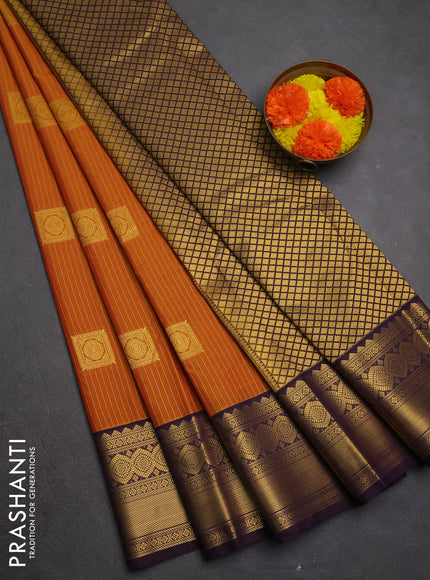 Semi kanchipuram silk saree rust shade and deep purple with allover zari weaves & buttas and zari woven border