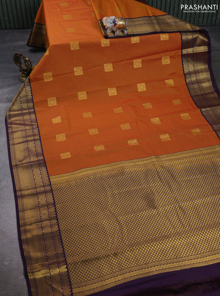 Semi kanchipuram silk saree rust shade and deep purple with allover zari weaves & buttas and zari woven border