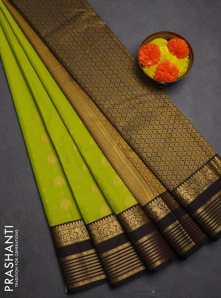 Semi kanchipuram silk saree light green and coffee brown with allover zari woven buttas and zari woven korvai border