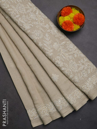 Khadi linen cotton saree beige with embroidery buttas and kantha stitch work pallu & border