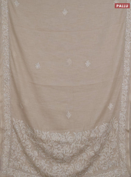 Khadi linen cotton saree beige with embroidery buttas and kantha stitch work pallu & border