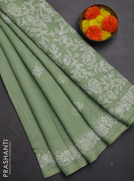 Khadi linen cotton saree pastel green with embroidery buttas and kantha stitch work pallu & border