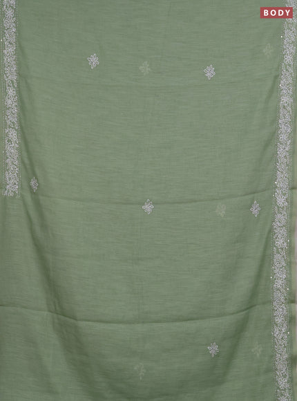 Khadi linen cotton saree pastel green with embroidery buttas and kantha stitch work pallu & border