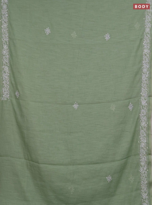 Khadi linen cotton saree pastel green with embroidery buttas and kantha stitch work pallu & border