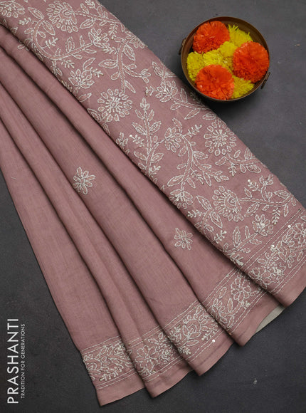 Khadi linen cotton saree pastel pink with embroidery buttas and kantha stitch work pallu & border