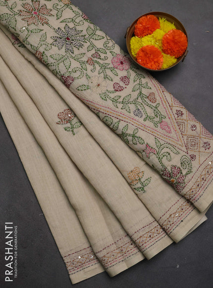 Khadi linen cotton saree beige with floral embroidery buttas and kantha stitch work pallu & border