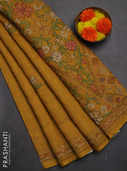 Khadi linen cotton saree mustard yellow with floral embroidery buttas and kantha stitch work pallu & border