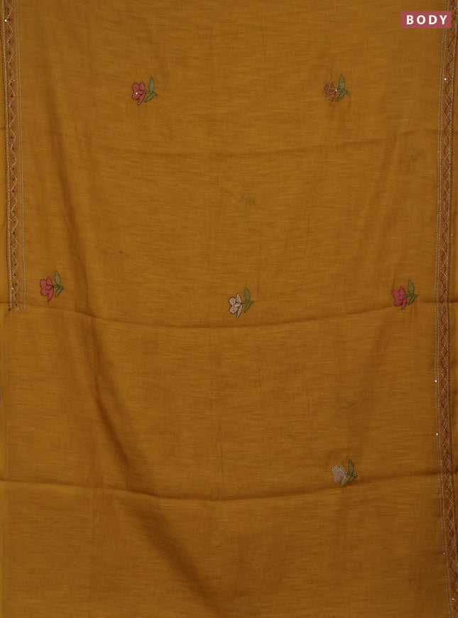 Khadi linen cotton saree mustard yellow with floral embroidery buttas and kantha stitch work pallu & border